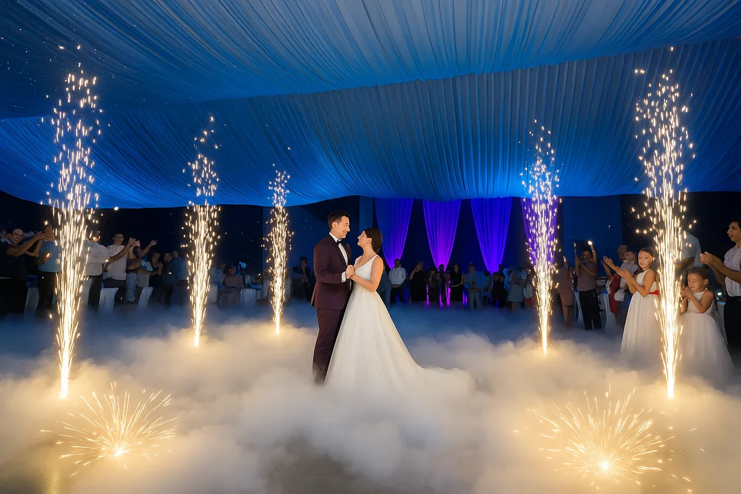 First dance on low fog between sparkler fountains